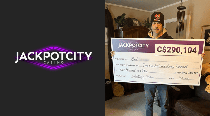 Winner from Espanola holding a JackpotCity Casino check for C$290,104.